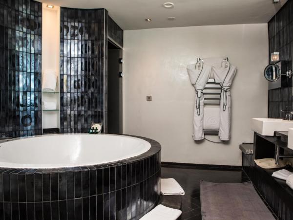 Sofitel Casablanca Tour Blanche : photo 4 de la chambre suite lit king-size impériale avec salon et salle à manger séparés