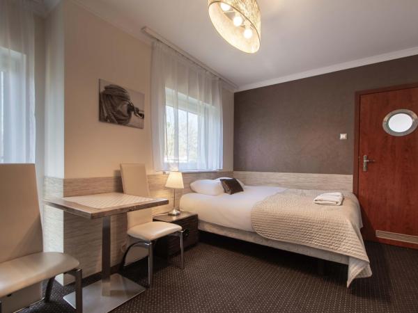 Villa 33 Blisko Plaży : photo 7 de la chambre chambre triple