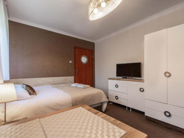 Villa 33 Blisko Plaży : photo 6 de la chambre chambre triple