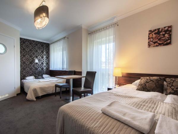 Villa 33 Blisko Plaży : photo 3 de la chambre chambre quadruple