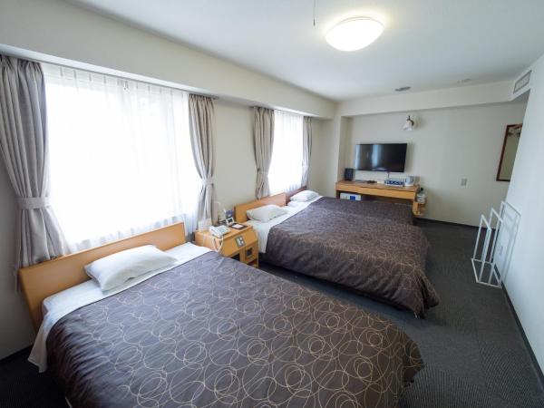 Hotel Shin Osaka : photo 5 de la chambre chambre lits jumeaux standard avec lit d'appoint - non-fumeurs