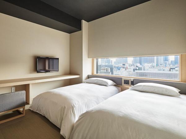 ONSEN RYOKAN YUEN SHINJUKU : photo 2 de la chambre chambre lits jumeaux confort - vue sur ville/non-fumeurs