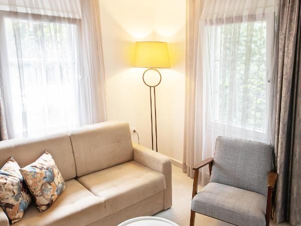 Flag Suites +12 : photo 4 de la chambre suite - vue sur jardin