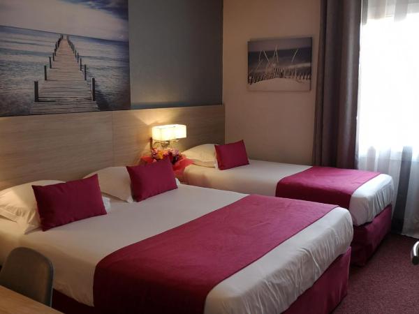 Atoll Hotel restaurant : photo 5 de la chambre chambre triple (1 lit double et 1 lit simple)