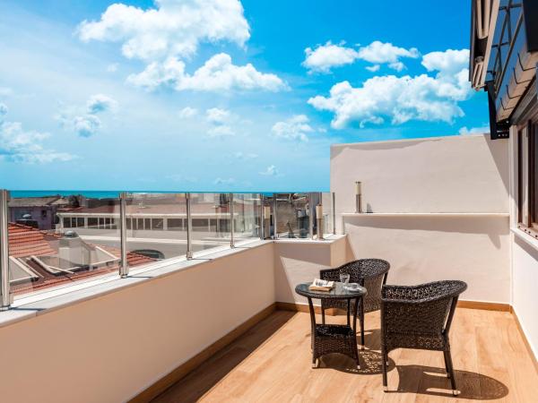 Kupeli Hotel : photo 1 de la chambre chambre double avec balcon - vue sur mer