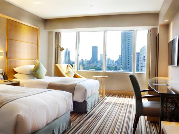 Jin Jiang Tower : photo 2 de la chambre chambre lits jumeaux deluxe - vue sur ville