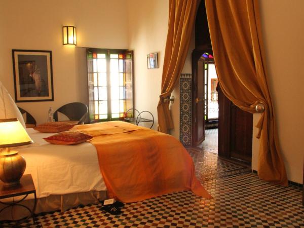 Riad Laaroussa : photo 1 de la chambre chambre double jaune