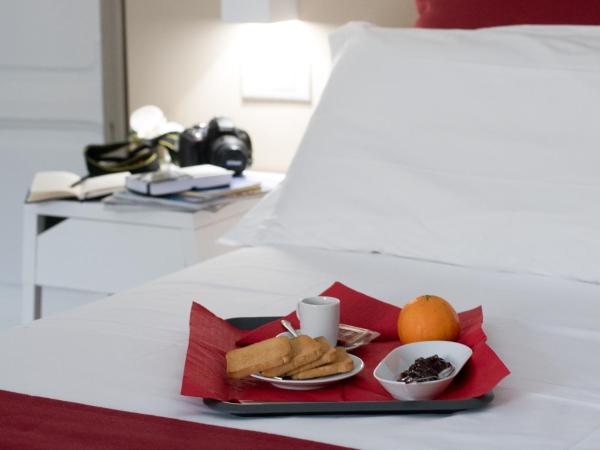 Genova46 Suites & Rooms : photo 2 de la chambre chambre deluxe double ou lits jumeaux