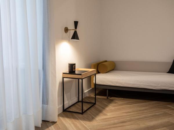 Blanq Comedias : photo 8 de la chambre chambre quadruple avec salle de bains privative