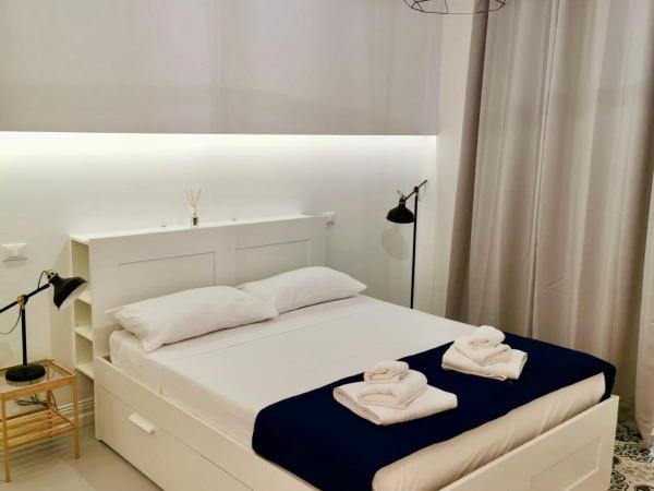 Porta San Biagio Rooms : photo 9 de la chambre chambre double avec lit d'appoint