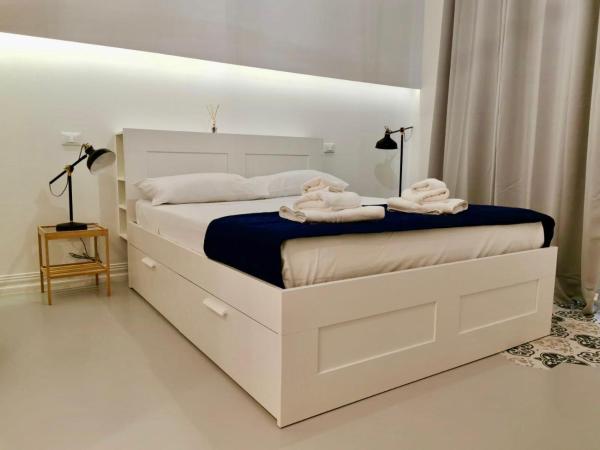 Porta San Biagio Rooms : photo 10 de la chambre chambre double avec lit d'appoint