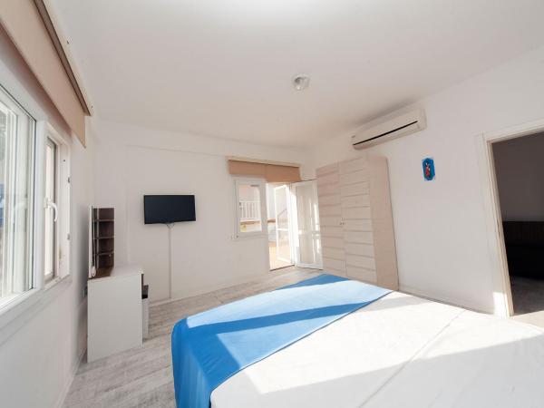 Metins Gümüşlük : photo 3 de la chambre chambre triple deluxe