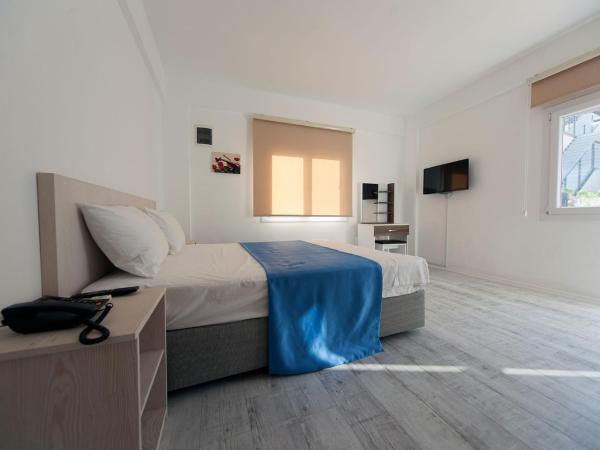 Metins Gümüşlük : photo 5 de la chambre chambre triple deluxe