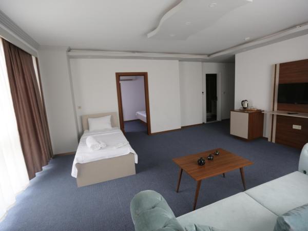 TEVETOGLU HOTEL : photo 2 de la chambre chambre triple de luxe