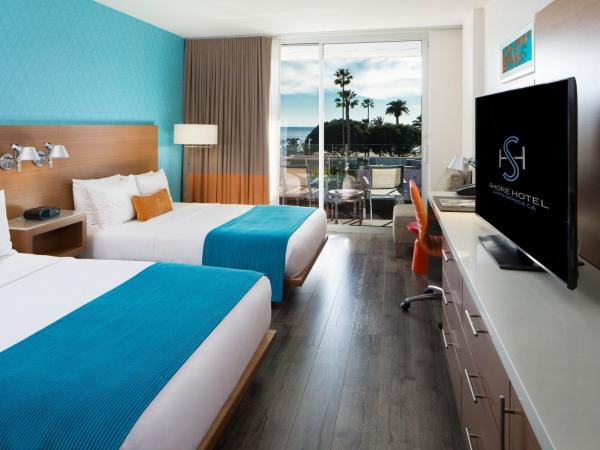 Shore Hotel : photo 1 de la chambre logement avec 2 lits doubles - vue partielle sur océan