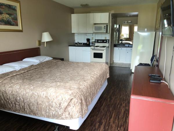 Travellers Inn : photo 1 de la chambre chambre lit queen-size 