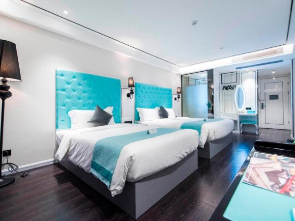 Xana Hotelle Shenzhen Airport Terminal : photo 1 de la chambre chambre lits jumeaux deluxe