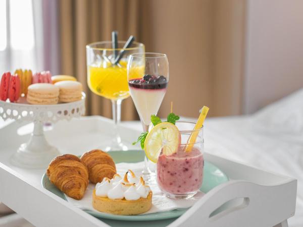 Hotel Maritimo : photo 5 de la chambre chambre lits jumeaux avec balcon et vue sur la montagne