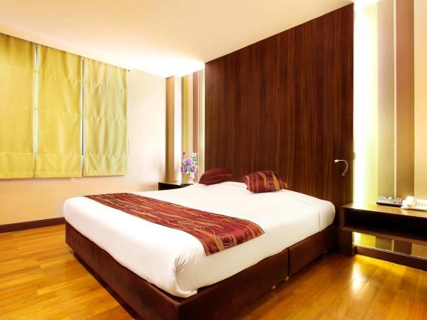 Bally Suite Silom : photo 1 de la chambre chambre deluxe double ou lits jumeaux