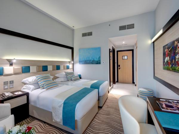 City Avenue Hotel : photo 5 de la chambre chambre deluxe double ou lits jumeaux