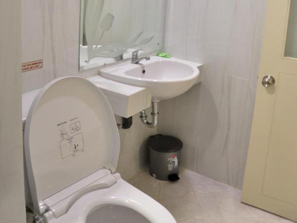 Grand Kebonsari Guesthouse : photo 2 de la chambre chambre lit king-size deluxe