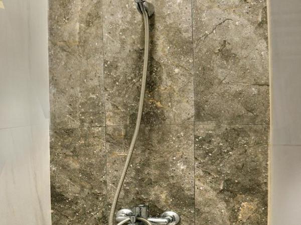 Grand Kebonsari Guesthouse : photo 3 de la chambre chambre lit king-size deluxe