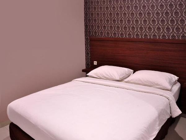 Grand Kebonsari Guesthouse : photo 4 de la chambre chambre lit king-size deluxe