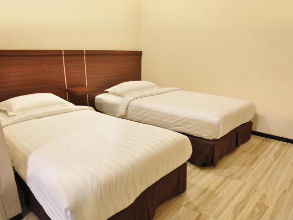 Grand Kebonsari Guesthouse : photo 5 de la chambre chambre lit king-size deluxe