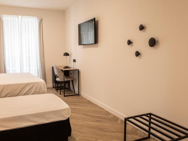 Blanq Comedias : photo 6 de la chambre chambre triple avec salle de bains privative