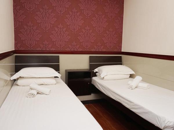 Hang Ho Hostel : photo 5 de la chambre chambre lits jumeaux standard