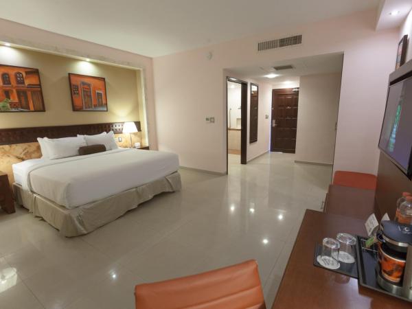 Wyndham Merida : photo 1 de la chambre chambre lit king-size deluxe - accessible aux personnes à mobilité réduite