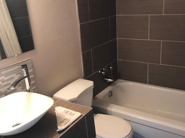 Rainbow Motor Inn - Fallsview : photo 4 de la chambre chambre lit queen-size 