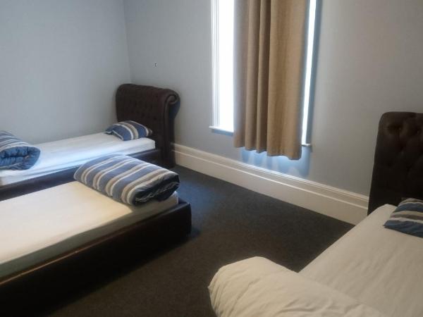 Backpackers Imperial Hotel : photo 3 de la chambre lit simple dans dortoir mixte de 3 lits