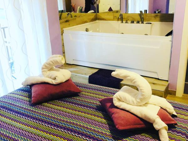 al Corso 203 : photo 1 de la chambre chambre lit king-size avec baignoire spa