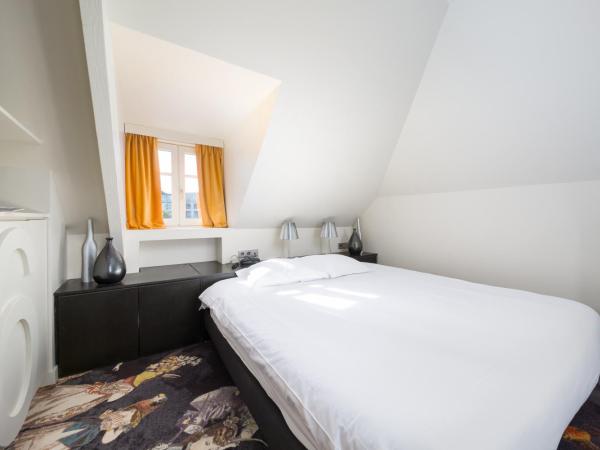 Restaurant Hotel Didier Méril : photo 2 de la chambre chambre double avec coin salon