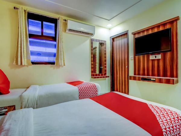 Sarthak Palace - Near New delhi Railwey station : photo 2 de la chambre chambre deluxe double ou lits jumeaux
