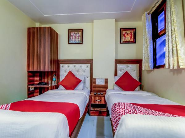 Sarthak Palace - Near New delhi Railwey station : photo 3 de la chambre chambre deluxe double ou lits jumeaux