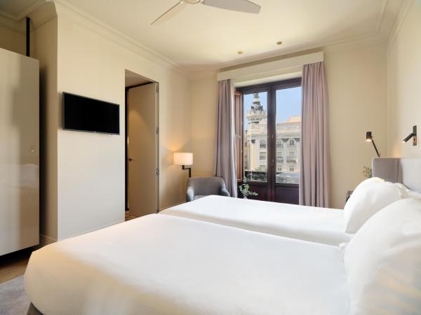 H10 Palacio Colomera : photo 2 de la chambre chambre double ou lits jumeaux - vue sur ville