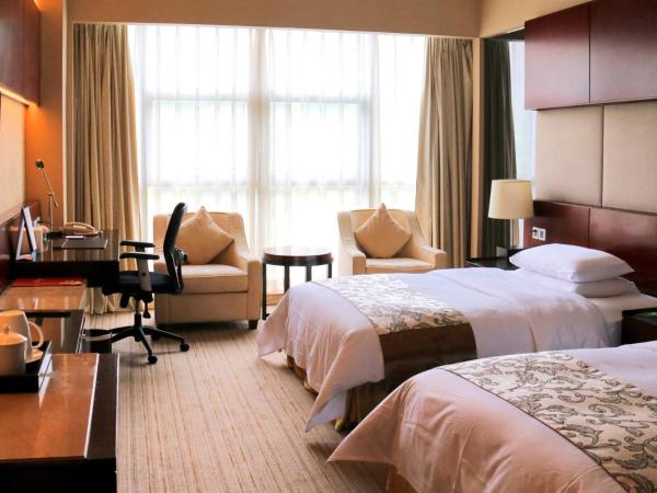 Grand Metropark Hotel Chongqing : photo 1 de la chambre chambre lits jumeaux supérieure - vue sur ville