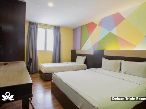 Hotel Weilia : photo 1 de la chambre chambre triple deluxe