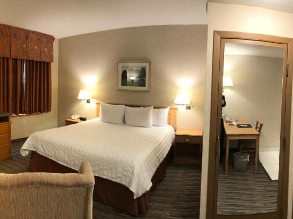 Humphry Inn and Suites : photo 5 de la chambre suite lit king-size