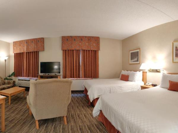 Humphry Inn and Suites : photo 3 de la chambre suite lit queen-size