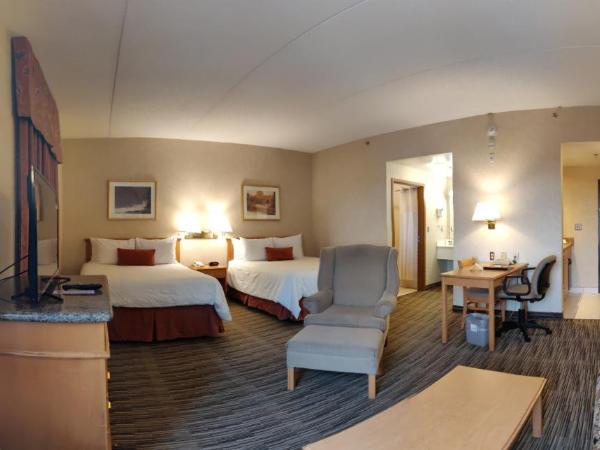 Humphry Inn and Suites : photo 6 de la chambre suite lit queen-size