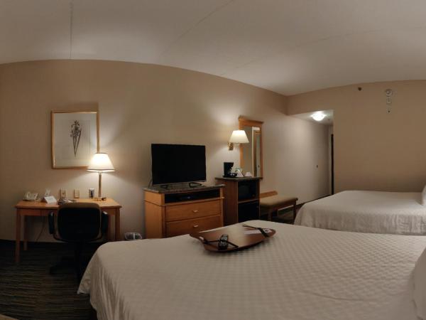 Humphry Inn and Suites : photo 2 de la chambre chambre lit queen-size