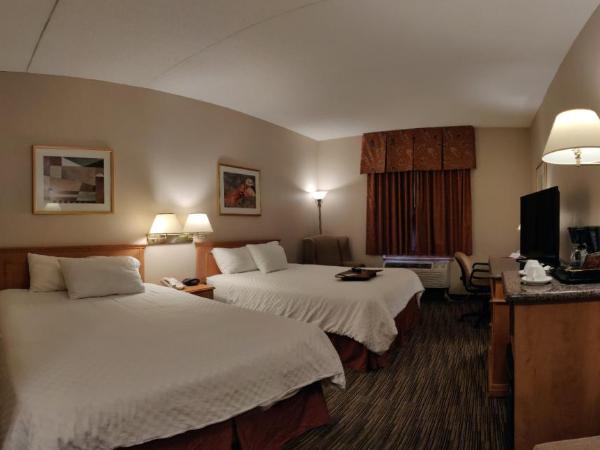 Humphry Inn and Suites : photo 4 de la chambre chambre lit queen-size