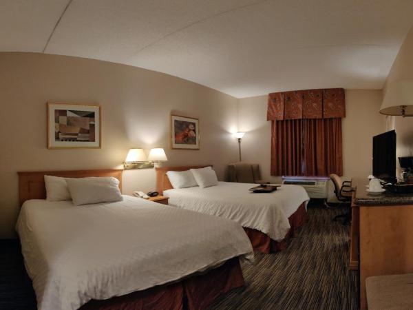 Humphry Inn and Suites : photo 5 de la chambre chambre lit queen-size