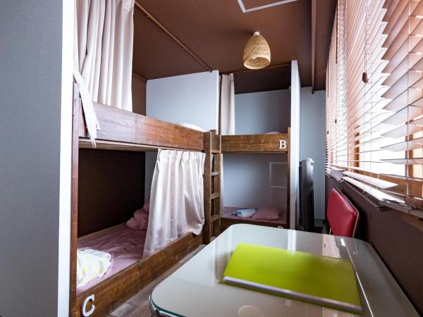 Clover House Sapporo : photo 1 de la chambre chambre quadruple avec baignoire
