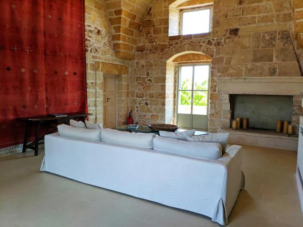 Masseria Trapana : photo 2 de la chambre suite deluxe avec lit king-size