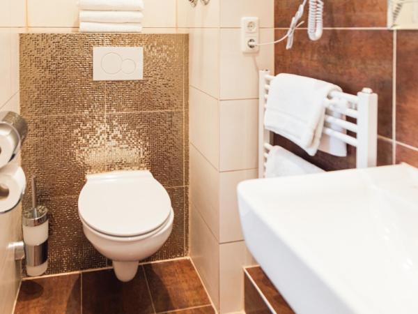 Hotel Hamburger Perle : photo 8 de la chambre chambre triple deluxe