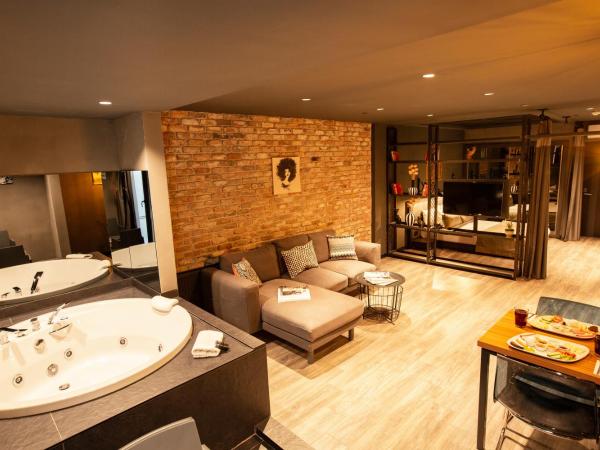 Cityloft 161 : photo 4 de la chambre suite jardin avec bain à remous